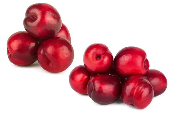 Set di frutti di prugna rossi isolati su sfondo bianco Foto Stock Royalty Free