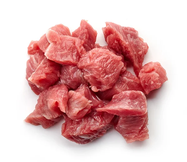 Heap of raw diced beef meat isolated on white, from above — Stock Photo, Image