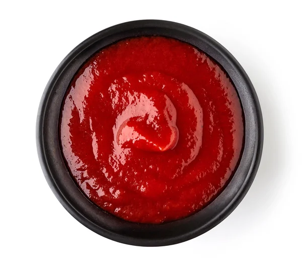 Kečup nebo rajčatová omáčka na bílém pozadí — Stock fotografie