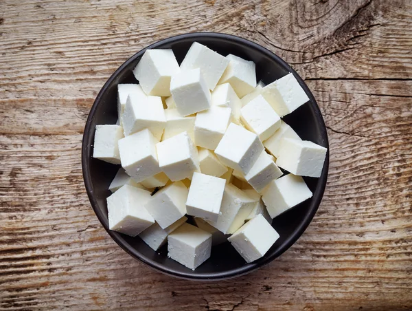 上から柔らかいチーズ正方形のボウル — ストック写真