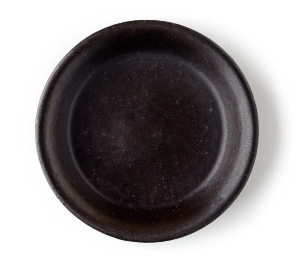 Black empty bowl isolated on white, from above — Stock Photo, Image