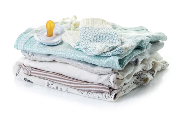 Pile of baby clothes isolated on white — Stock Photo, Image