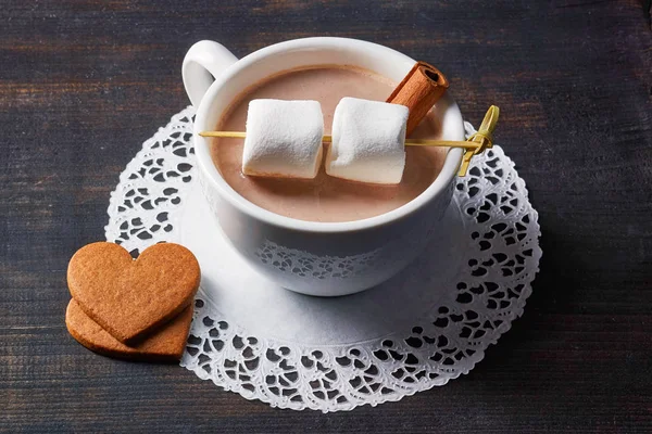 Cup of hot cocoa drink with sweets — Stock Photo, Image