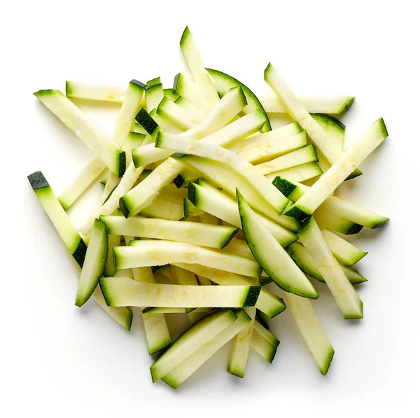 Tas de courgettes tranchées isolées sur blanc, d'en haut — Photo