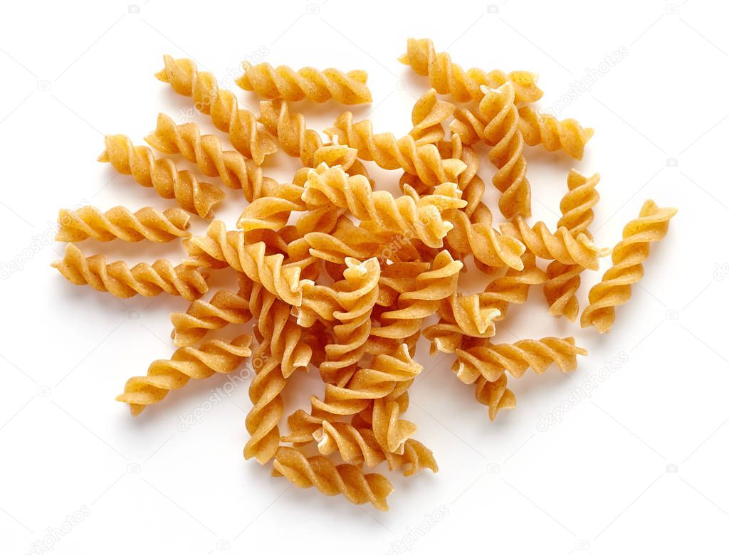 whole grain pasta isolated on white, from above