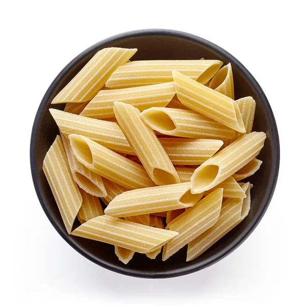 Pasta en un tazón aislado sobre blanco, desde arriba — Foto de Stock