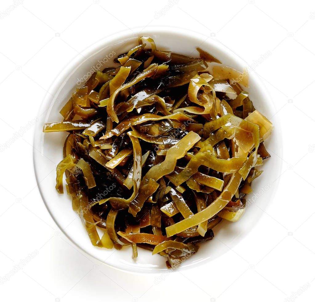 Bowl of laminaria seaweed isolated on white, from above