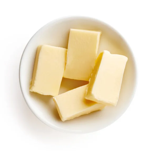 Bol de beurre sur fond blanc — Photo