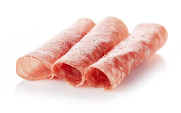 Sliced summer sausage on white background — Stock Photo, Image