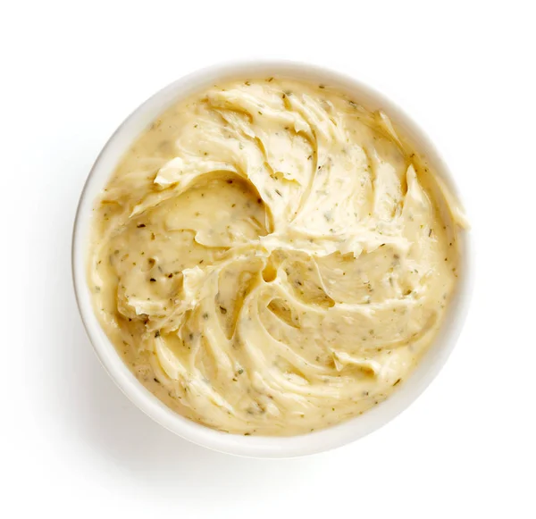 Misku s bylinkovým máslem, izolované na bílém, shora — Stock fotografie