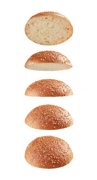 Burger bulle toppar flyger på vit bakgrund — Stockfoto