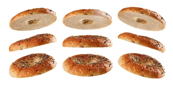 Halved Bagel Tops Levitating Different Positions Isolated White Background — Stock Photo, Image