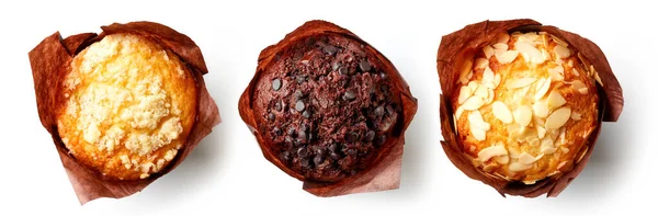 Muffin Assortiti Carta Marrone Isolati Sfondo Bianco Vista Dall Alto — Foto Stock