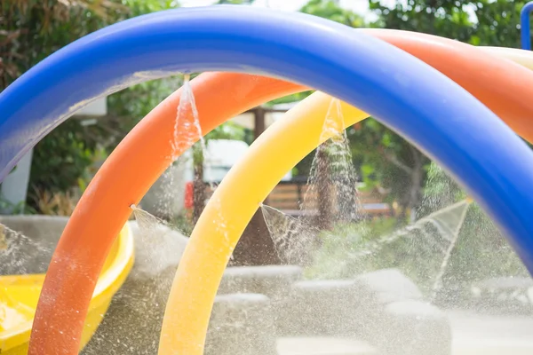 Splash pad or sprayground in water park for kids.