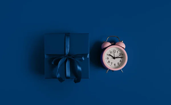 Blue Gift Box Bow Pink Alarm Clock Classic Blue Paper — Stock Photo, Image