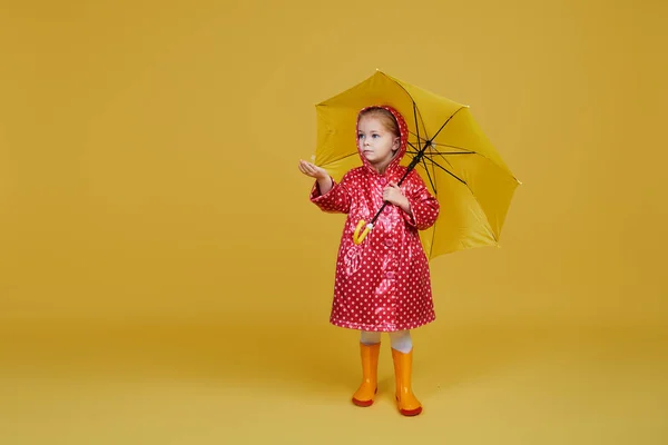 Cheerful Child Girl Yellow Umbrella Red Rain Coat Colored Yellow — 스톡 사진