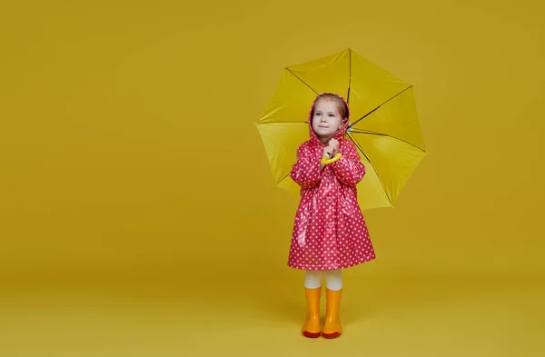 Cheerful Child Girl Yellow Umbrella Red Rain Coat Colored Yellow — 스톡 사진