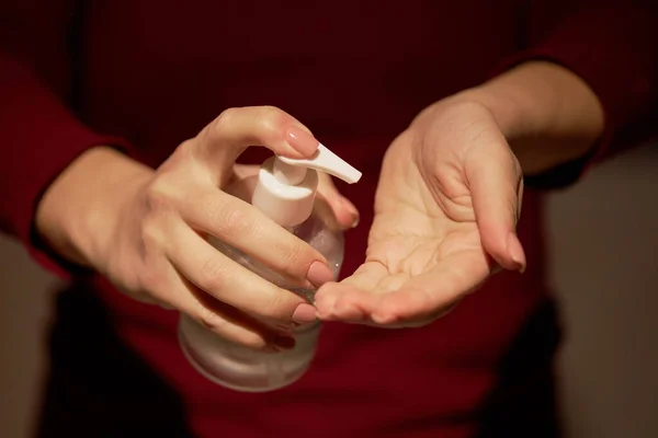 Woman Treating Her Hands Liquid Antiseptic Transparent Bottle Hygiene Concept — Stock Photo, Image