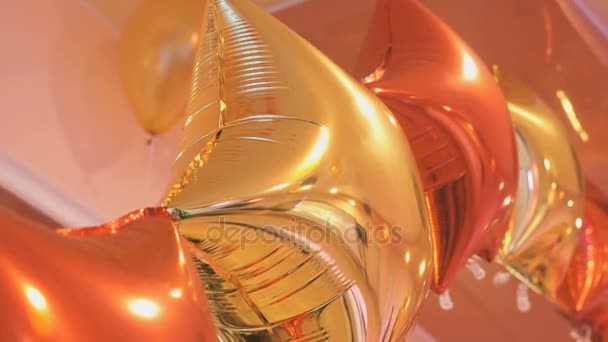 Balloons in the shape of stars at the wedding — Stock Video
