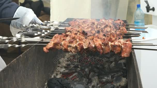 Cooking of beef kebabs on the brazier — Stock Video