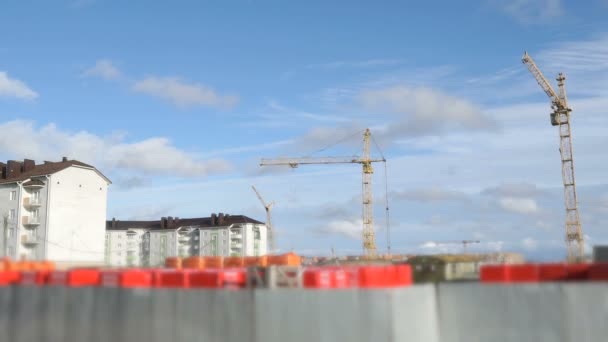 Construction cranes work at construction site — Stock Video