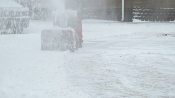 Man removing snow with snow plow machine — Stock Video