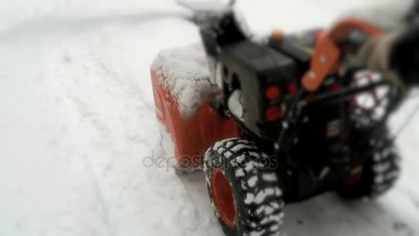 Man removing snow with snow plow machine — Stock Video