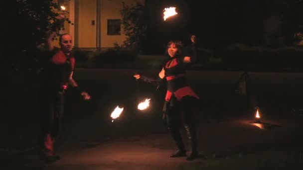 Fire show at night in summer outdoors — Stock Video