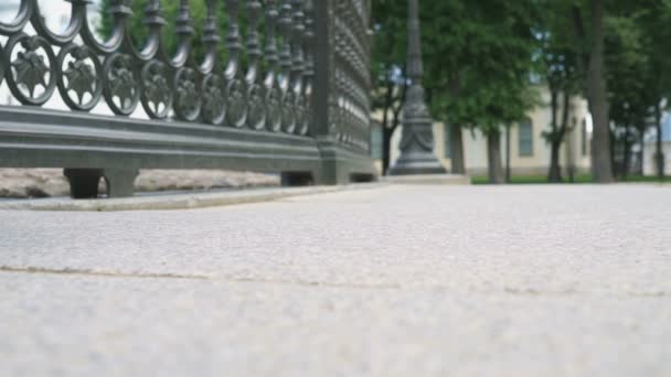 Close-up of legs of unknown people outdoors — Stock Video