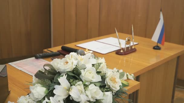 Close-up of a wedding table at registration office — Stock Video