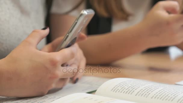 Unknown girl student with smartphone — Stock Video