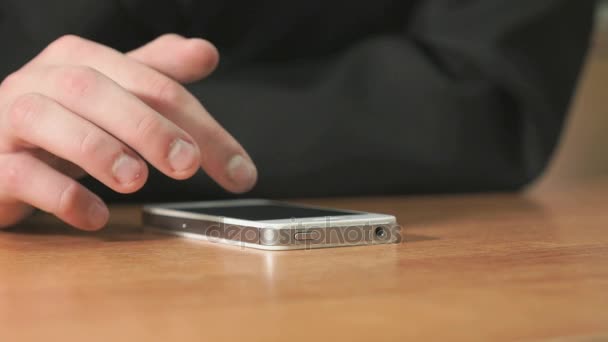 Student pressing finger on screen of smartphone — Stock Video