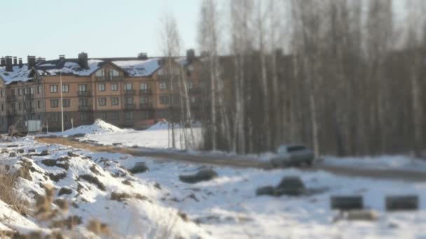 Bau eines Mehrfamilienhauses im Winter — Stockvideo