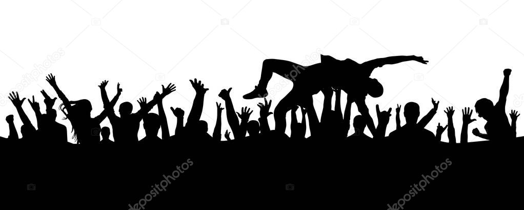  Jump into the crowd. A man leaps into his arms in a crowd of people silhouette