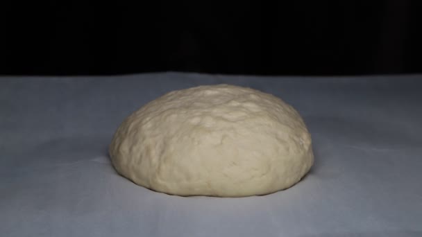 Yeast dough increases in size on black background — Stock Video