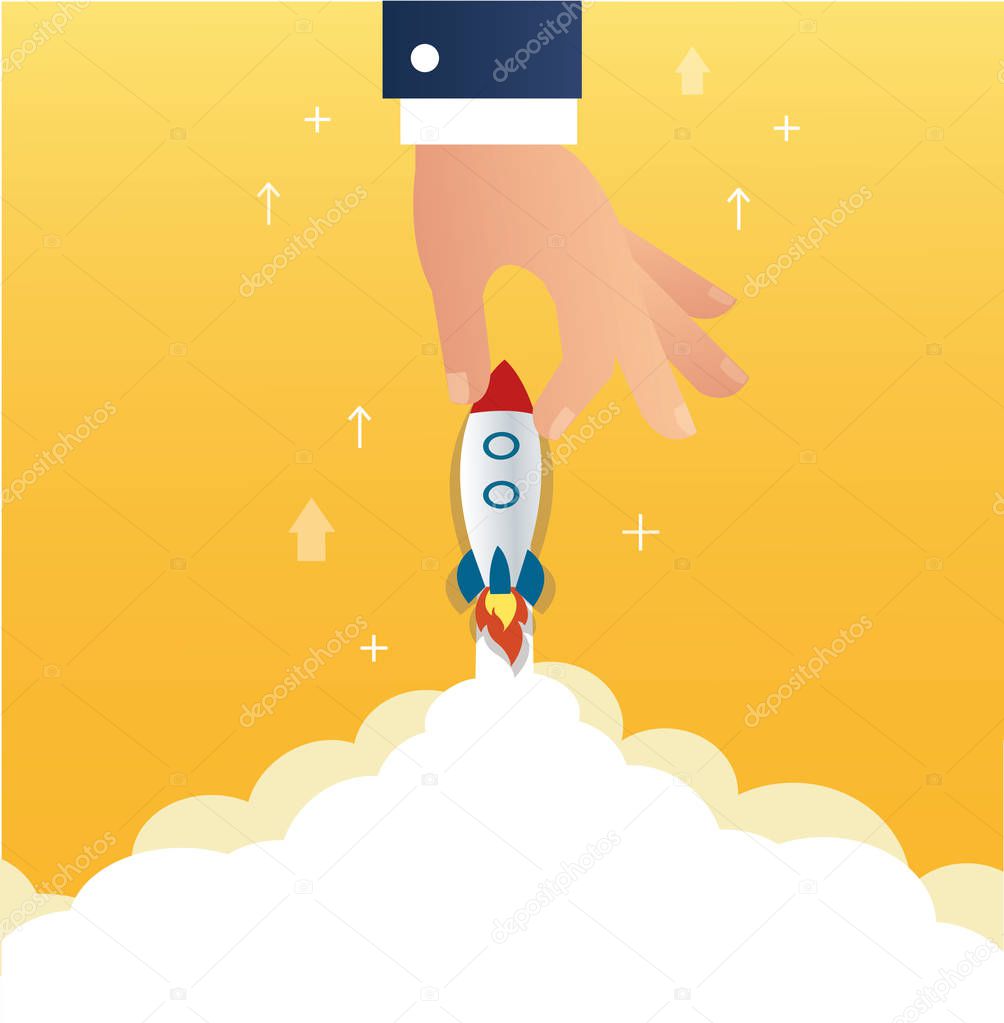 big hand holding a rocket startup business concept  