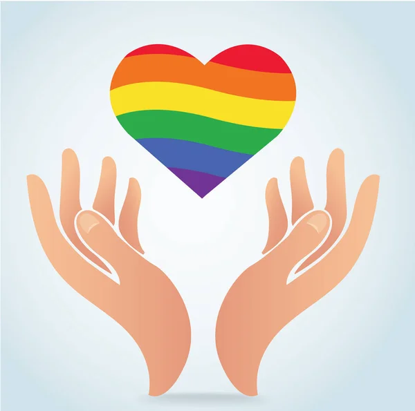 Mão segurando a bandeira do arco-íris em forma de coração ícone vetor —  Vetores de Stock