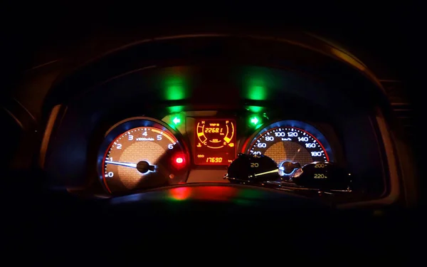 Close up car dashboard with black background — Stock Photo, Image