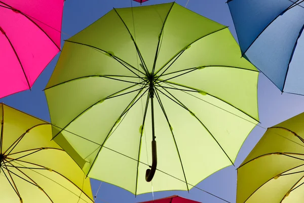 Colorful umbrella on the sky — Stock Photo, Image
