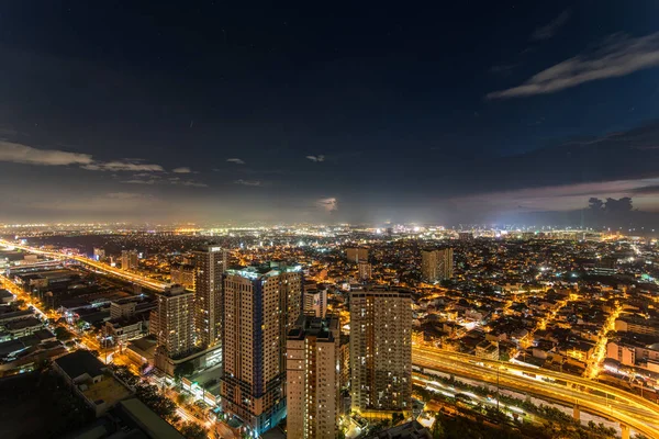 Metro Manila panoramę miasta o zachodzie słońca, Filipiny — Zdjęcie stockowe