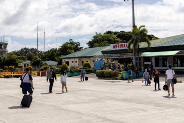Passengers arriving at Dumaguete Airport, Dumaguete City, Philippines, Dec 10, 2019 clipart