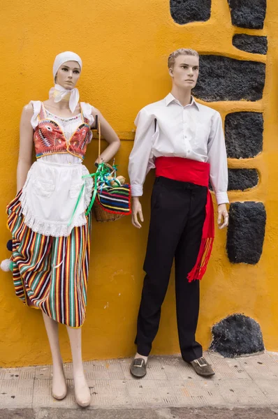 Couple of models dressed in traditional Canarian