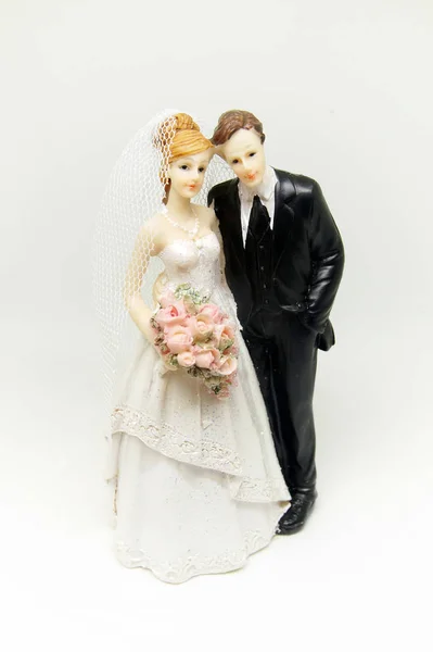 Statuette in the form of a newly-married couple Royalty Free Stock Photos