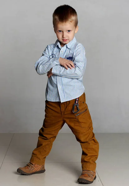 Little boy posing in studio — Stock Photo, Image