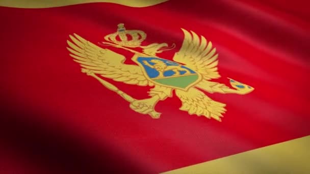 Montenegros flagga. Viftande flagga med mycket detaljerad textur sömlös loopable video. Sömlös ögla med mycket detaljerad textur. Loop klar i HD-upplösning — Stockvideo