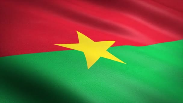 Флаг Буркина-Фасо. Размахивание флагом с очень подробной текстурой ткани бесшовное петлевое видео. Бесшовная петля с очень подробной текстурой ткани. Петля готова с разрешением 4К — стоковое видео