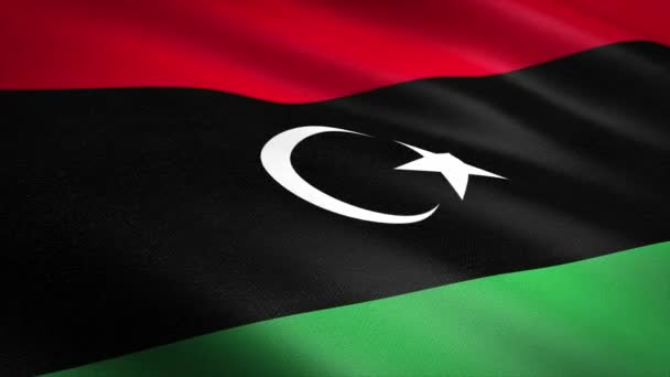 Vlag van Libië. Zwaaien vlag met zeer gedetailleerde stof textuur naadloze loopable video. Naadloze lus met zeer gedetailleerde stofstructuur. Loop klaar in 4k resolutie — Stockvideo