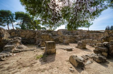 Phaistos şehir, Crete antik kalıntıları. Burada bir sarmal damgalı hiyeroglif sembol ile her iki tarafta ünlü Phaistos disk bir disk ateş kil kaplı bulundu.