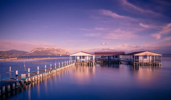 Small fishing houses on stilts on the lake Mesologgi, Greece — Stock Photo, Image