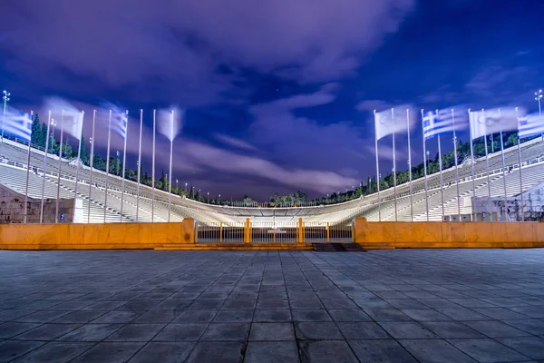 Panathenaic stadium in Athens at night, Greece (hosted the first modern Olympic Games in 1896), also known as Kalimarmaro which means good marble stone.